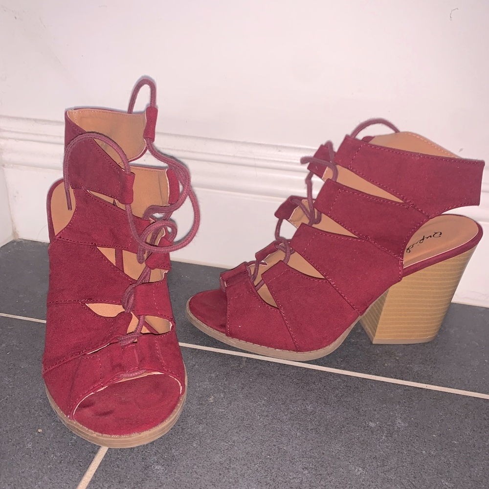 Razzleberry colored lace up heels. Brand New. Size 7.5